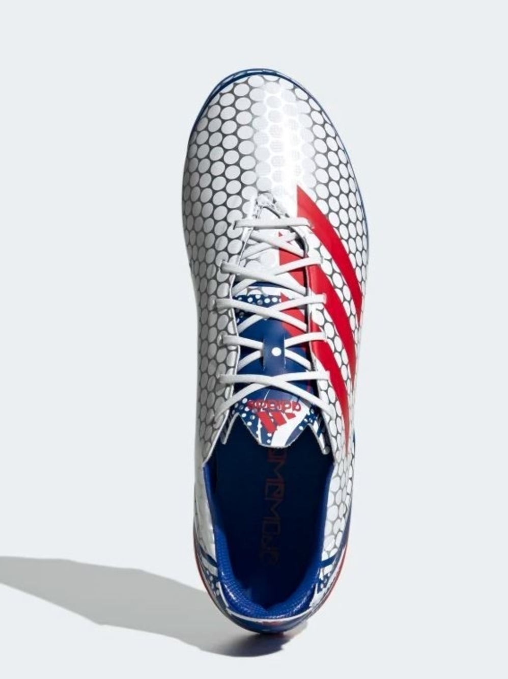 Adidas White Soccer Cleat with Red Stripes and Blue Details